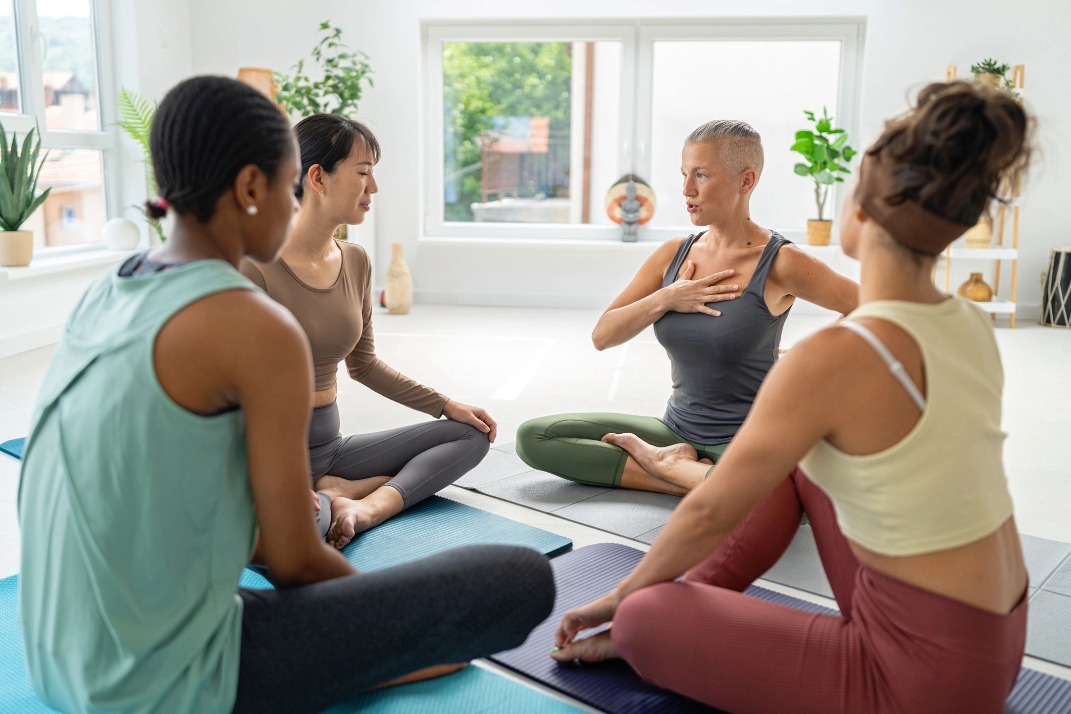 Small group practicing yoga together in a serene studio