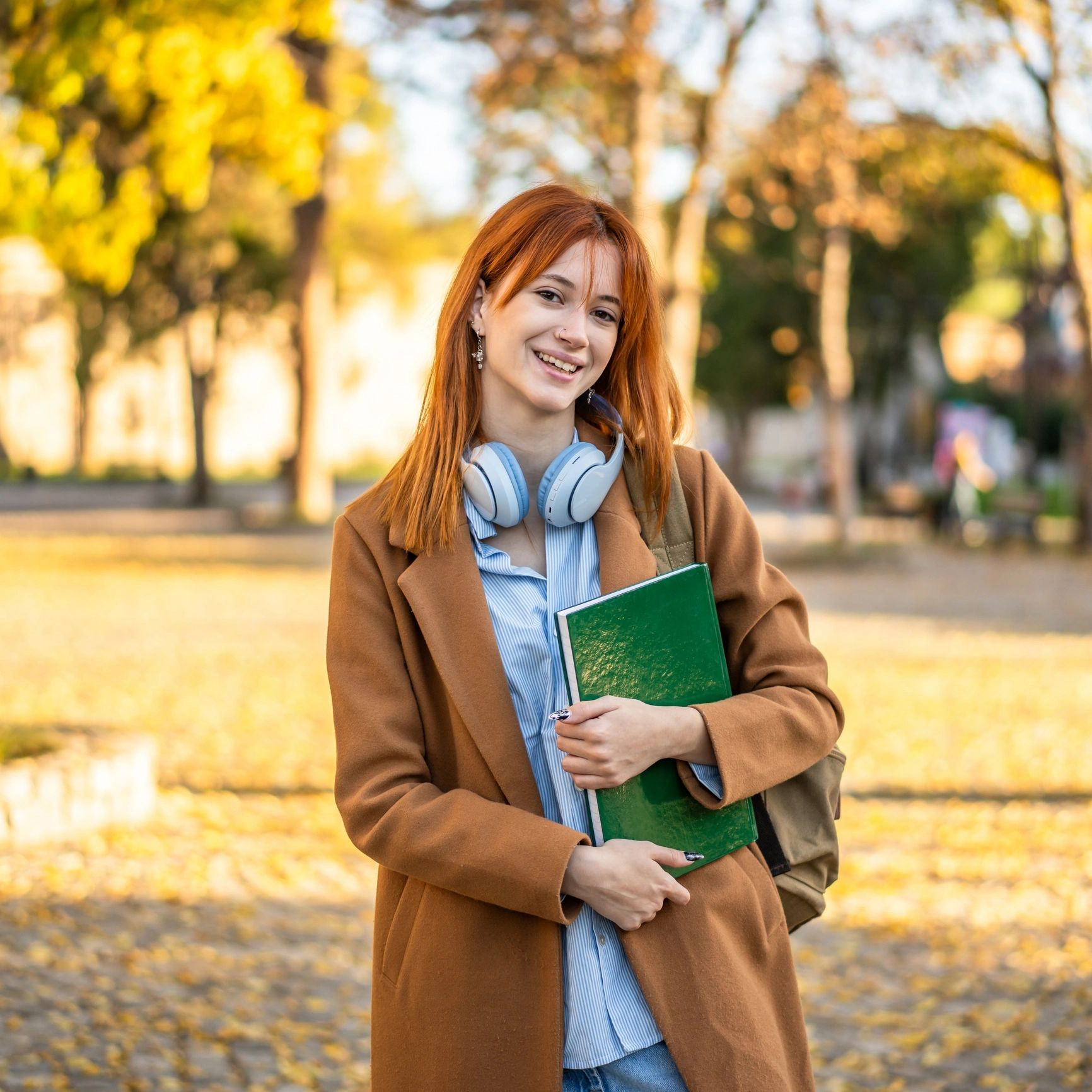 Portrait of a returning student smiling outdoors
